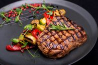 Grilled Meat on Black Round Plate