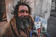 An Elderly Man with an Image of Saint Lazarus