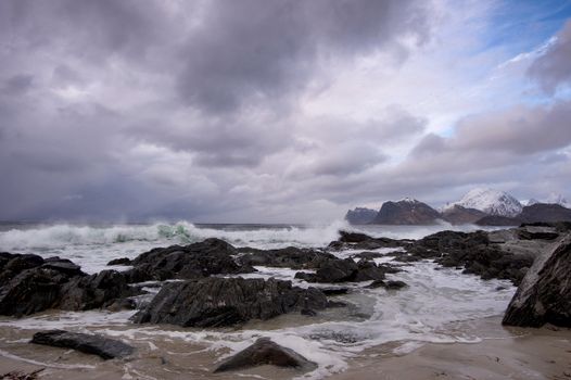 Rocky Shore Under Cloudy Sky