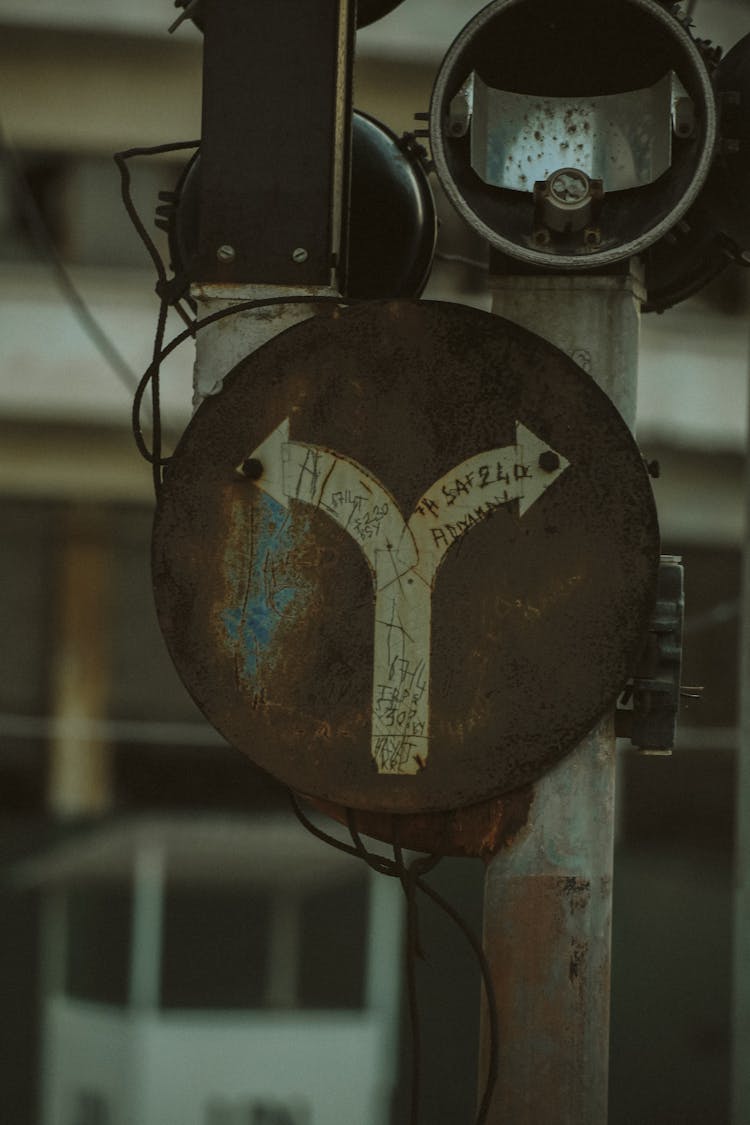 Close-up Of A Rusty Old Road Sign