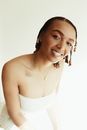 Smiling Woman in White Tube Dress