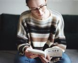 Woman in Brown and White Striped Sweater Holding White Ceramic Mug