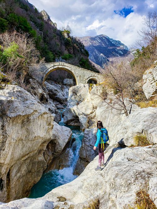 Free A hiker explores a rugged mountain stream in Albania. Stock Photo