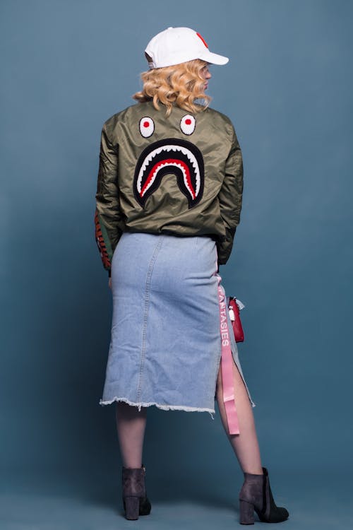 Woman Wearing Green Bathing Ape Jacket and Bottom Skirt