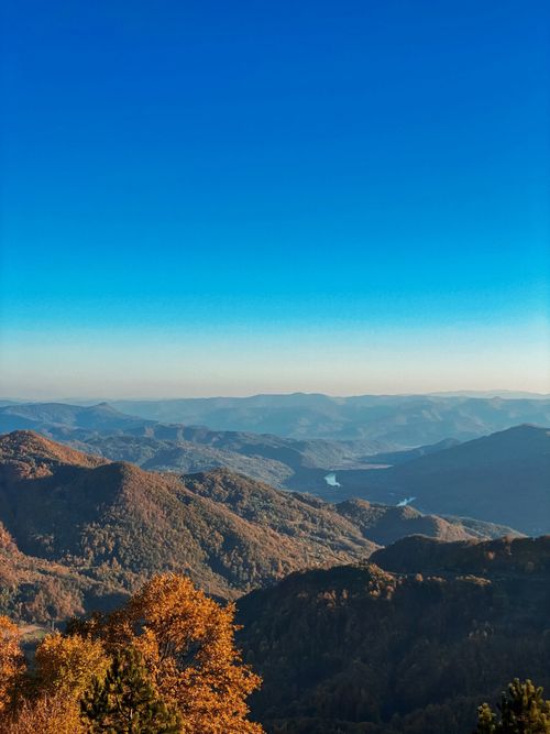 Free A breathtaking view of Serbian mountains with autumn foliage and clear blue skies. Stock Photo