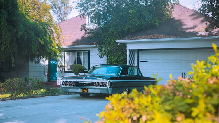 Black Vintage Car O The Driveway