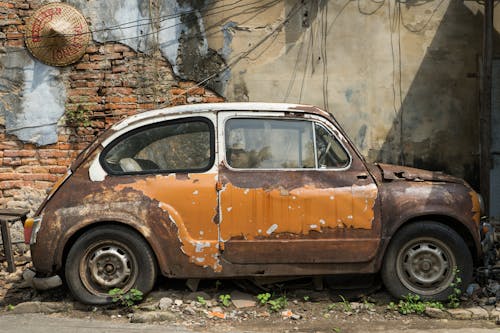 Photo of a Rusty Abandoned Car 