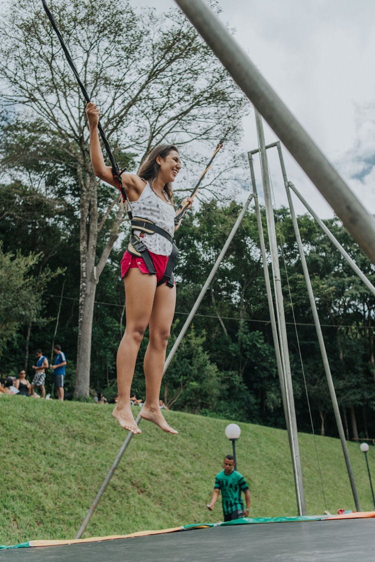 Happy Woman In A Trampoline