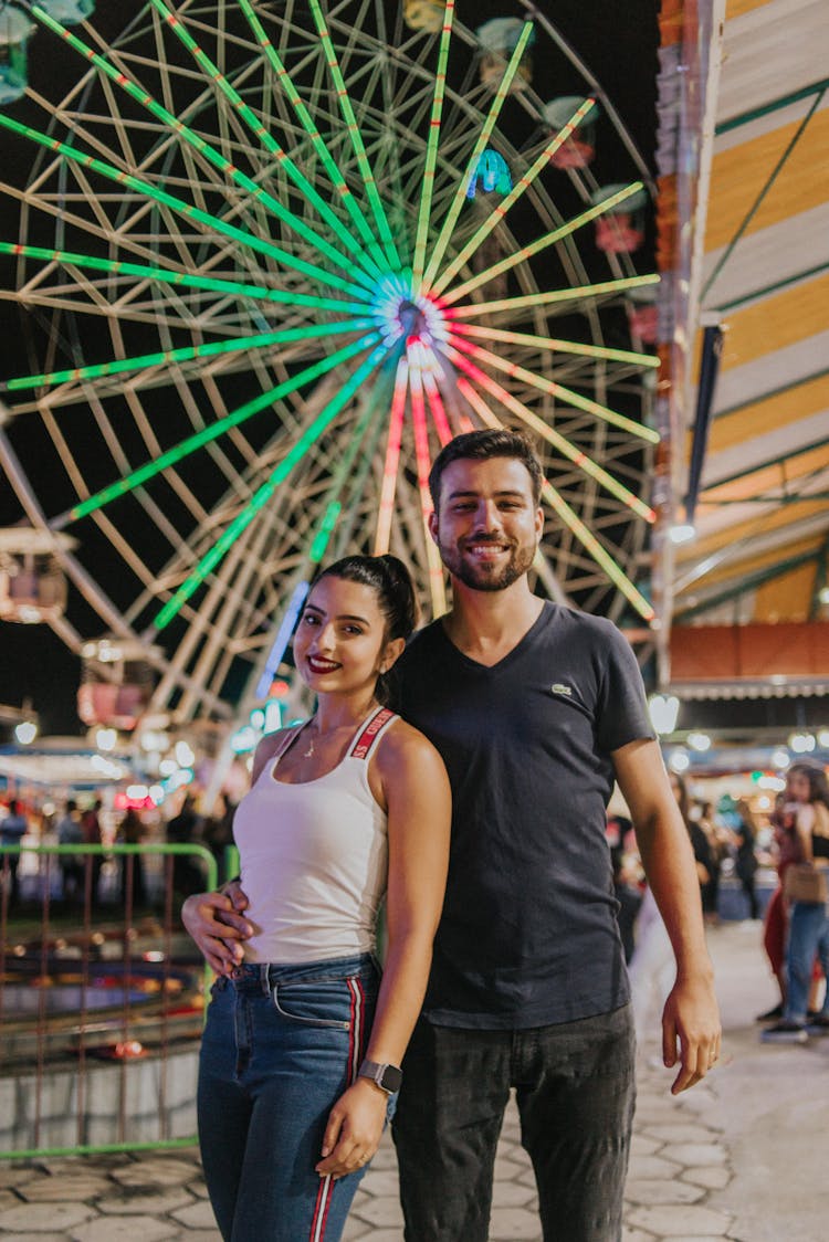 Happy Couple In Funfair