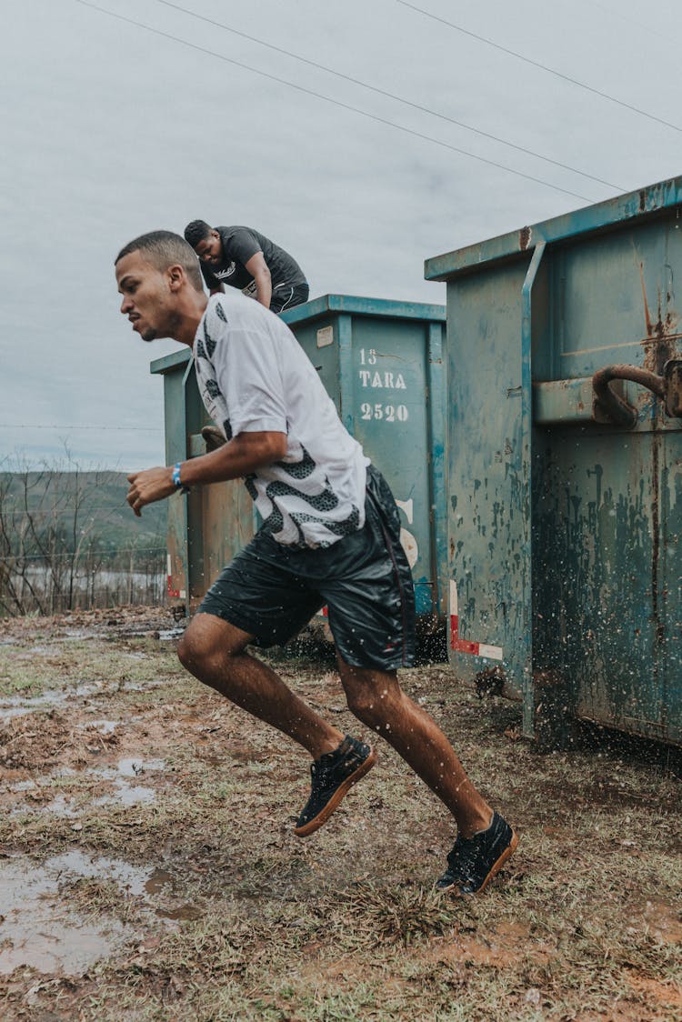 Man Running In The Mud 