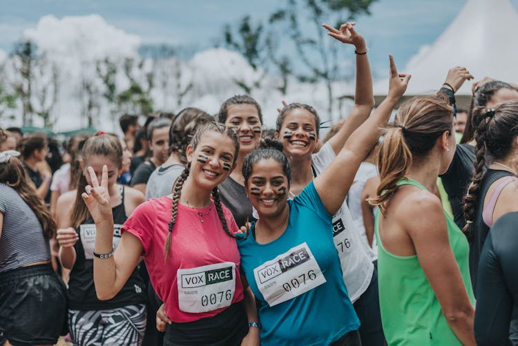 Race Participants Standing And Posing For A Photo 