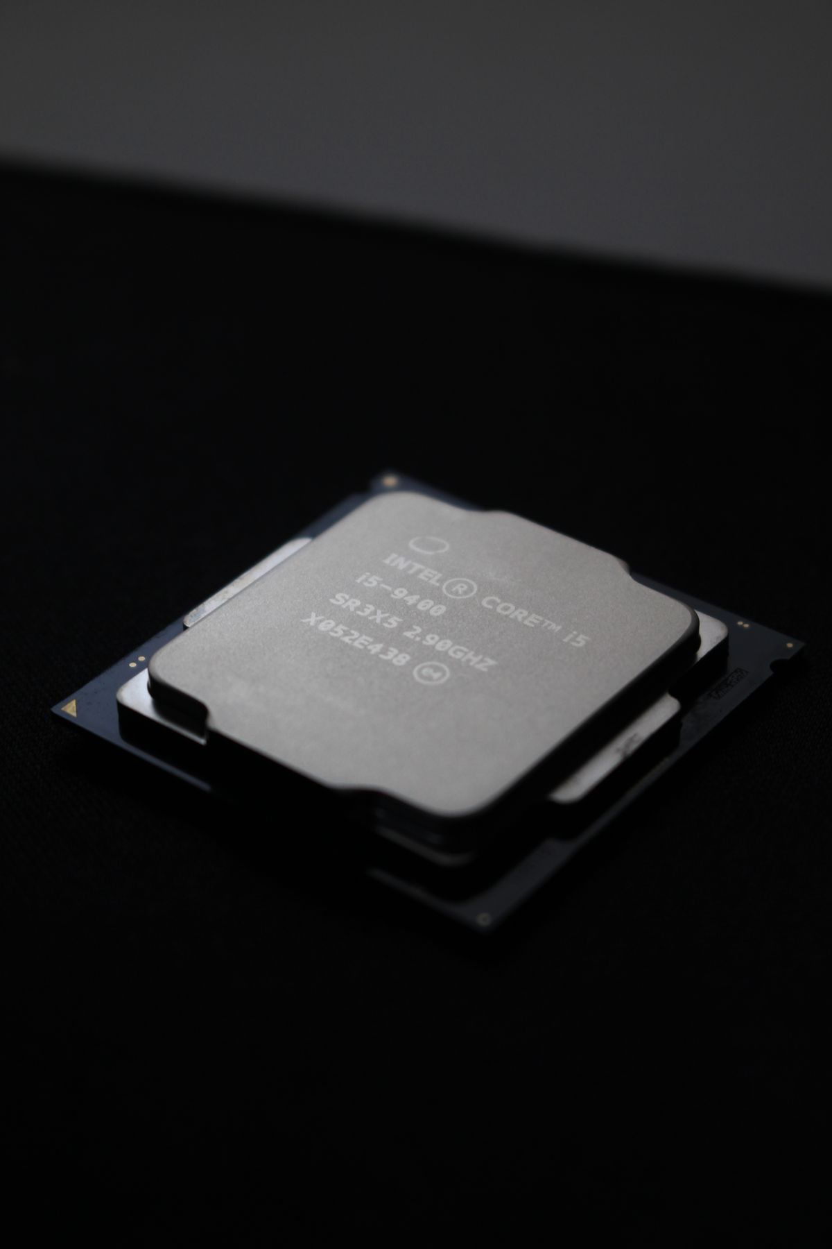 Macro photograph of a computer processor chip on a dark background