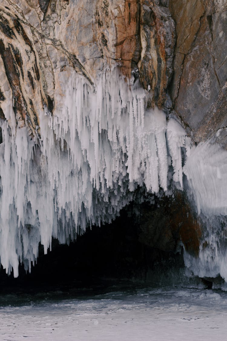 Ice Stalactites On A Cave