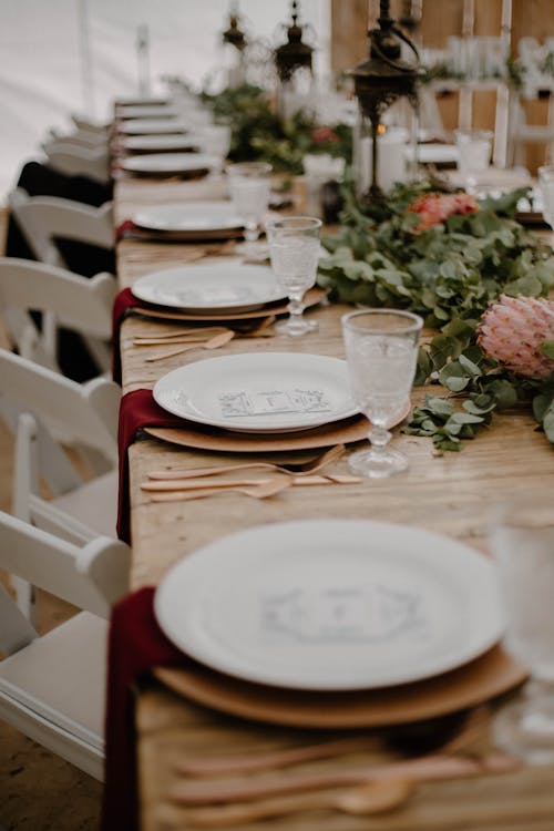 Free Plates and Goblets Arranged on the Table Stock Photo