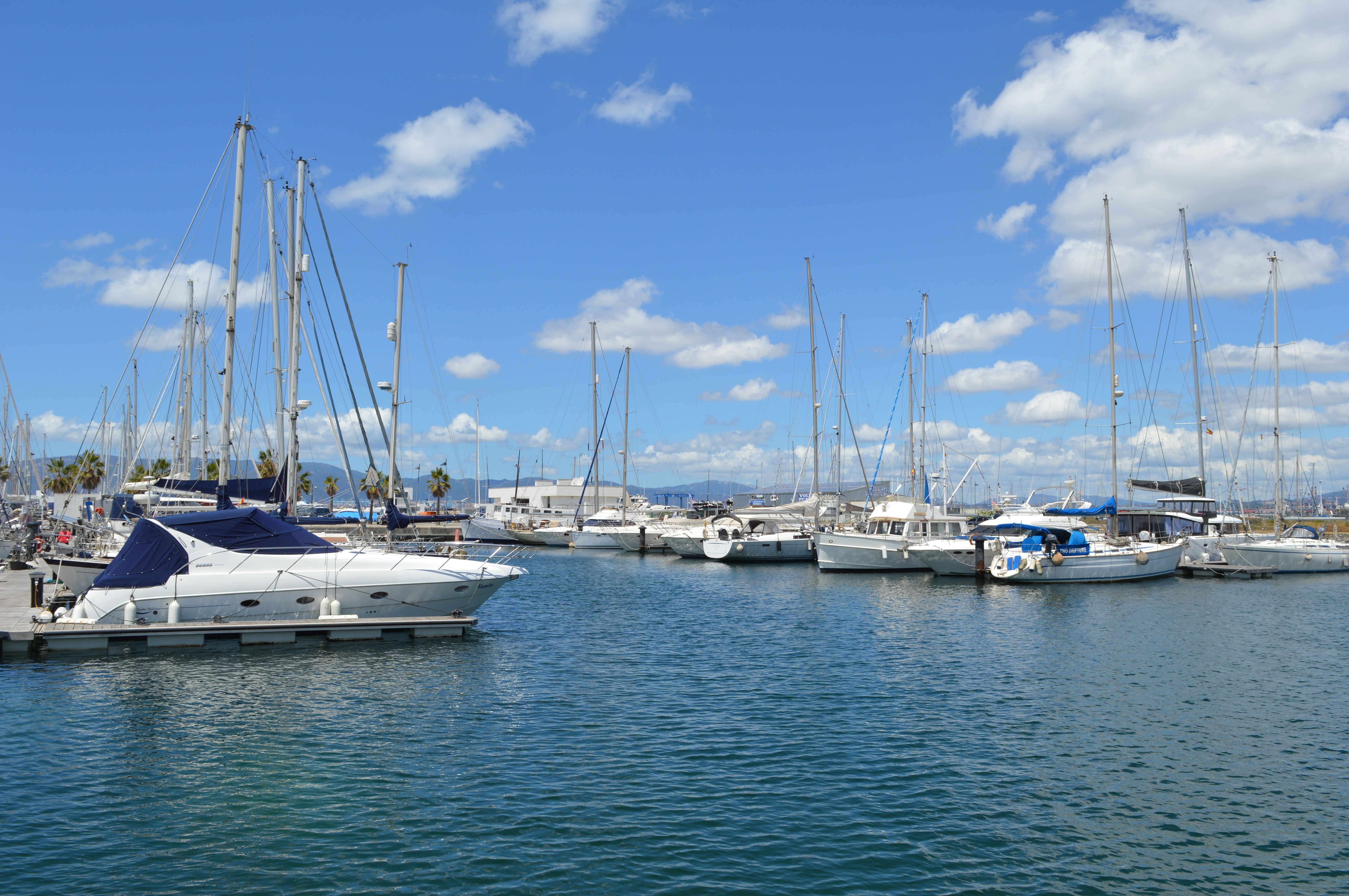 Breathtaking Unique 2 masts Classic Sailing Yacht in Barcelona Review: A Timeless Mediterranean Sailing Experience Review 2026 - Sailboats docked in a picturesque harbor under blue skies in Tarifa, Spain.