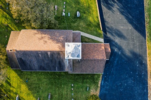Aerial View of a House with a Lawn