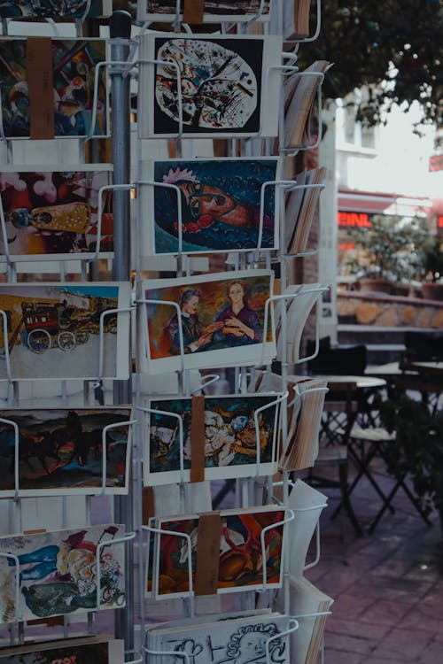 Free Variety of Postcards on a Rack Stock Photo