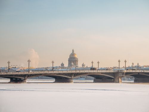Free Snowy winter view of Saint Isaac's Cathedral with a bridge in St. Petersburg, Russia. Stock Photo