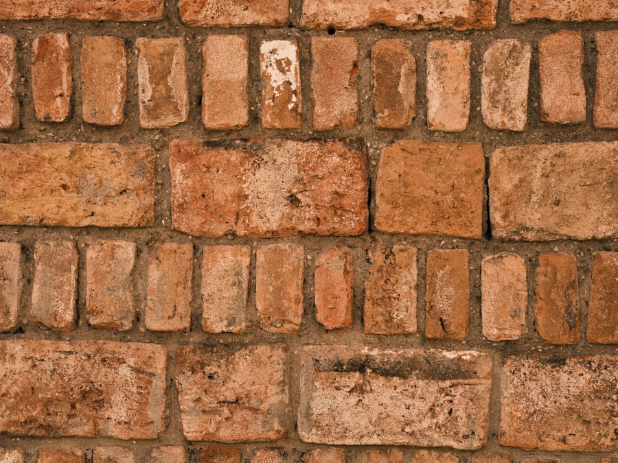 Large brick units separated by wide mortar joints