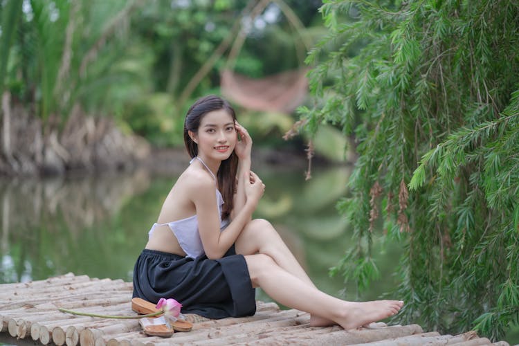 Woman Posing On Pier