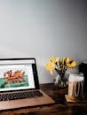 Laptop on the Table with Heraldic Symbol of Wales