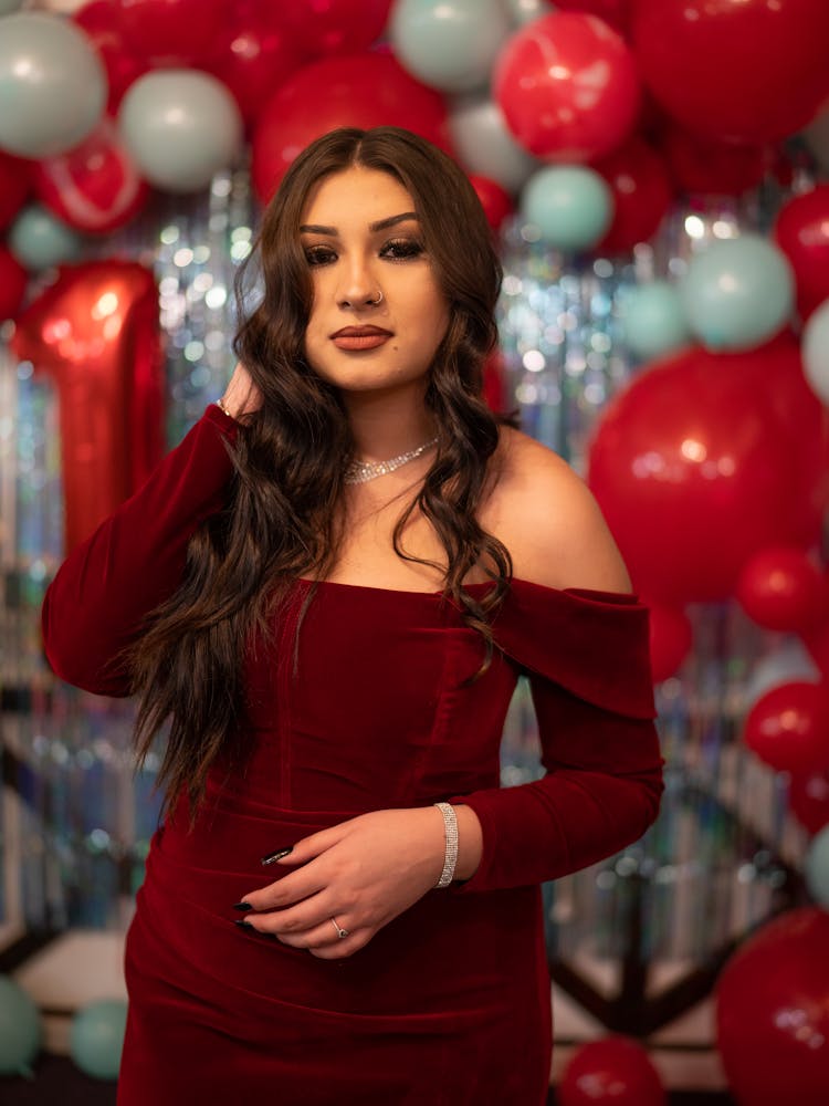 Beautiful Woman Wearing A Red Dress And Diamond Necklace