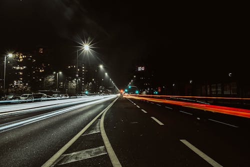 Photos gratuites de chaussée, crépuscule, faisceaux de lumières