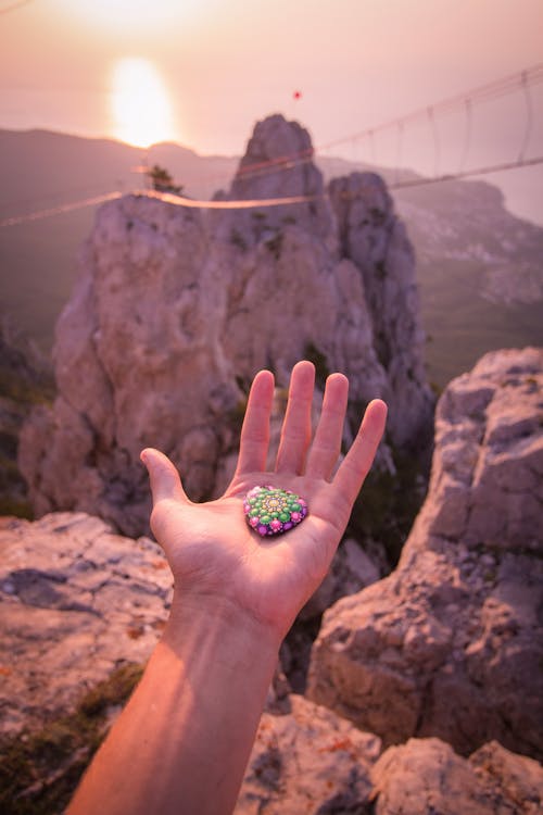 Free Pendant on a Person's Hand Stock Photo