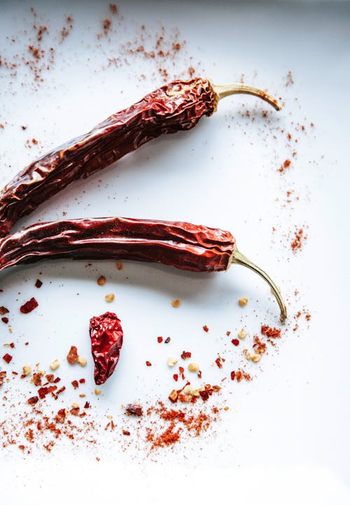 Free Red Chili on White Surface Stock Photo
