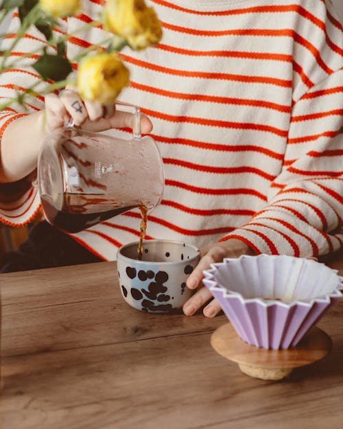 Free Pouring Tea in Cup Stock Photo