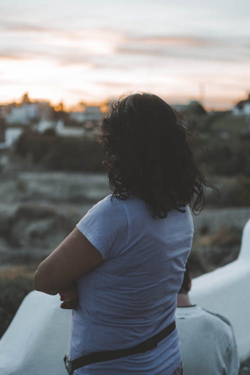 Free Back View of a Woman during Sunset Stock Photo
