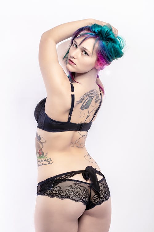 A Woman with Colored Hair Wearing Black Underwear