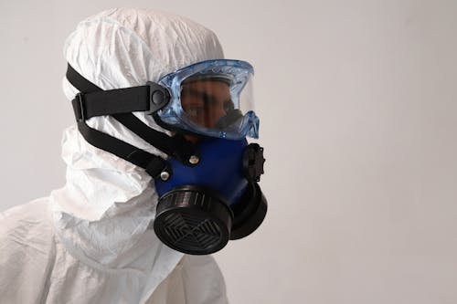 Free Person Wearing Blue Gas Mask Stock Photo