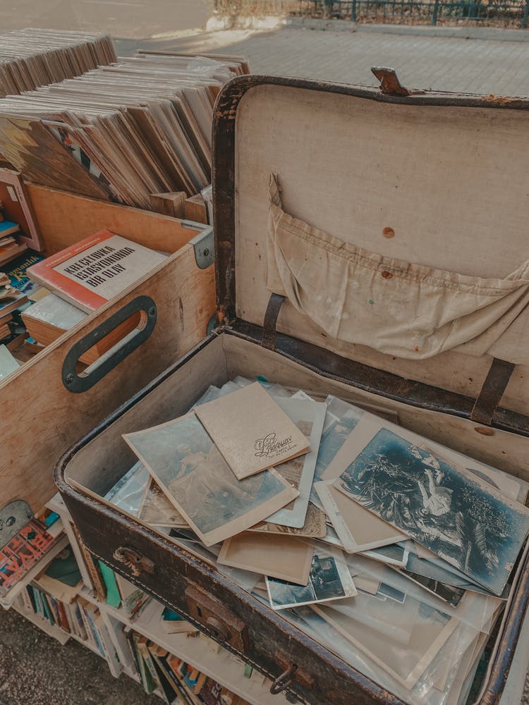 An Old Luggage With Vintage Pictures