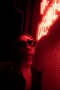 Woman in Black Leather Jacket Wearing Brown Sunglasses