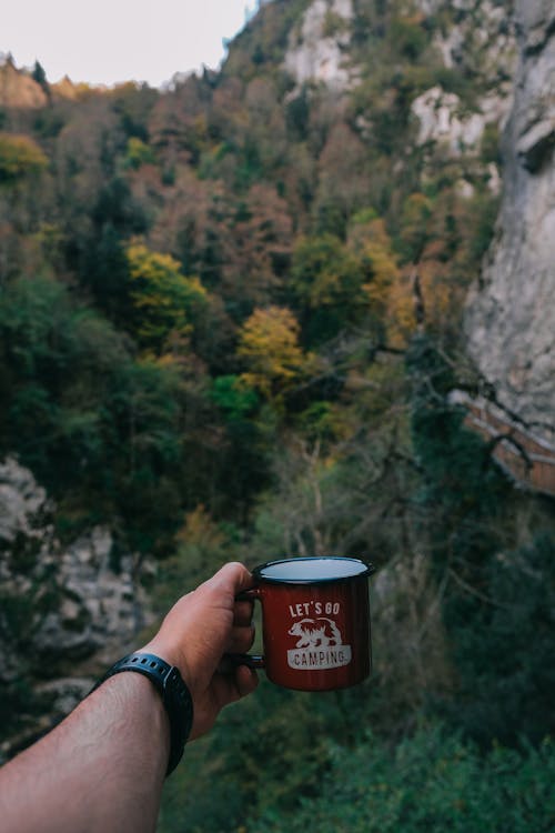 Point of View of a Person Holding a Mug