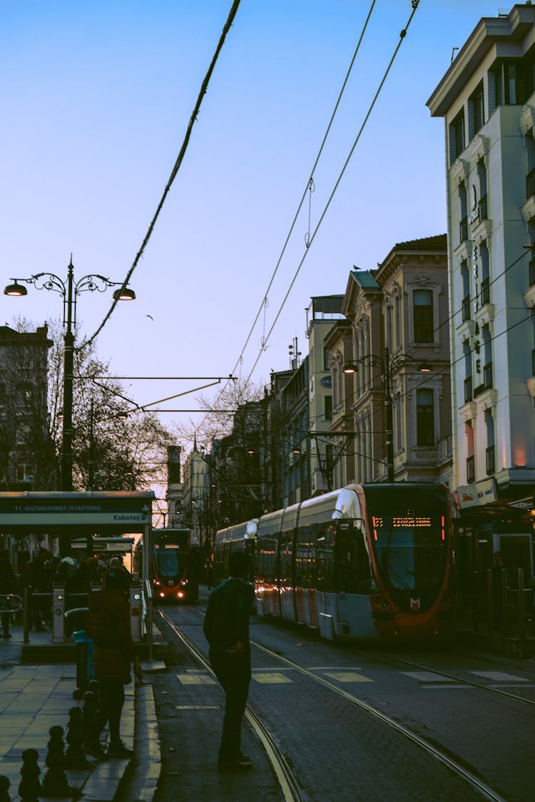 People Waiting On Tramway Station For Transport