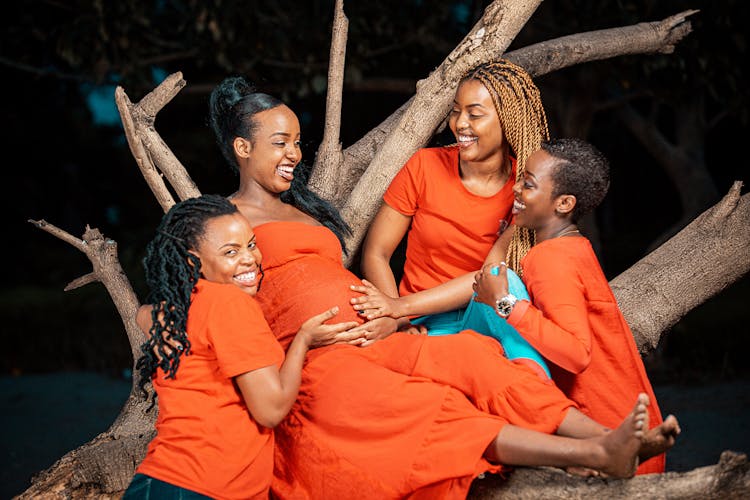 Happy Family Wearing Orange Clothes