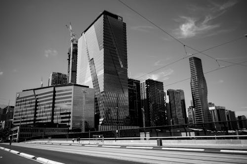 Grayscale Photo of City Buildings