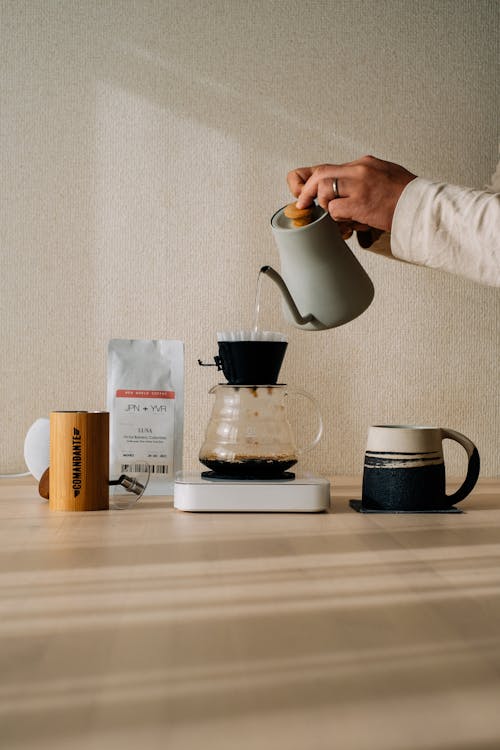 Free Person Making Drip Coffee Stock Photo