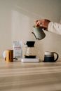 Person Brewing Pour Over Coffee at Home