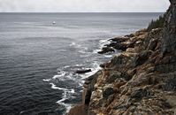 Brown Rocky Mountain Beside Sea
