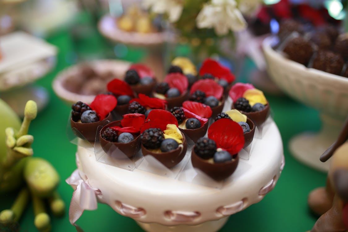 Free White Icing Covered Cake With Red and Black Berries on Top Stock Photo