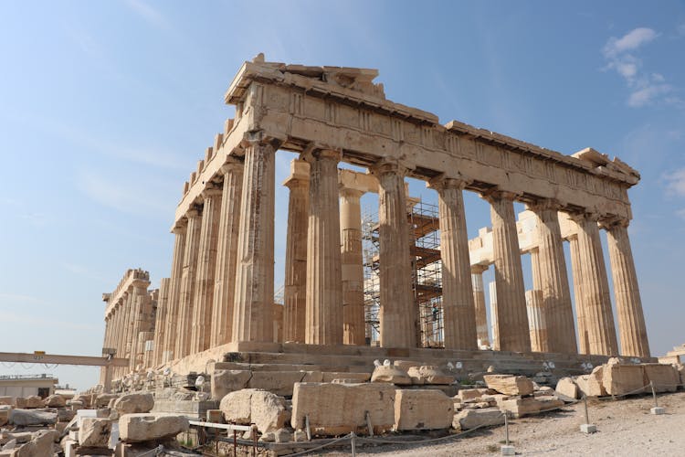 The Ruined Parthenon In Athens, Greece Under Blue Sky