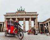 Man in Black Hoodie Riding Trike
