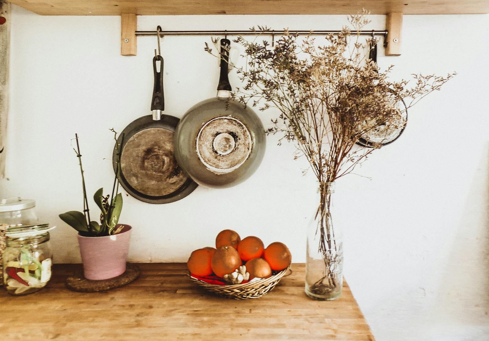 Kitchen Pans Hanging from Wall