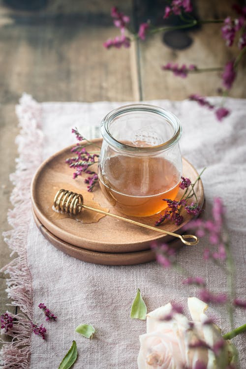 Free Still Life with a Jar of Honey, and Herbs Stock Photo