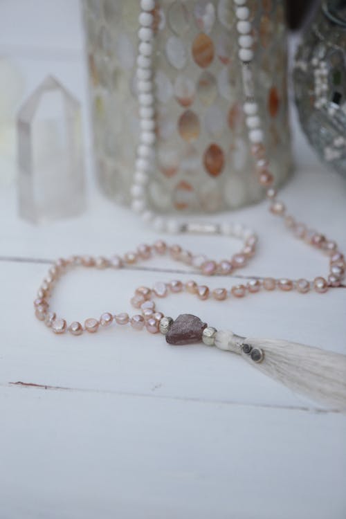 Free Brown and White Beaded Necklace Stock Photo