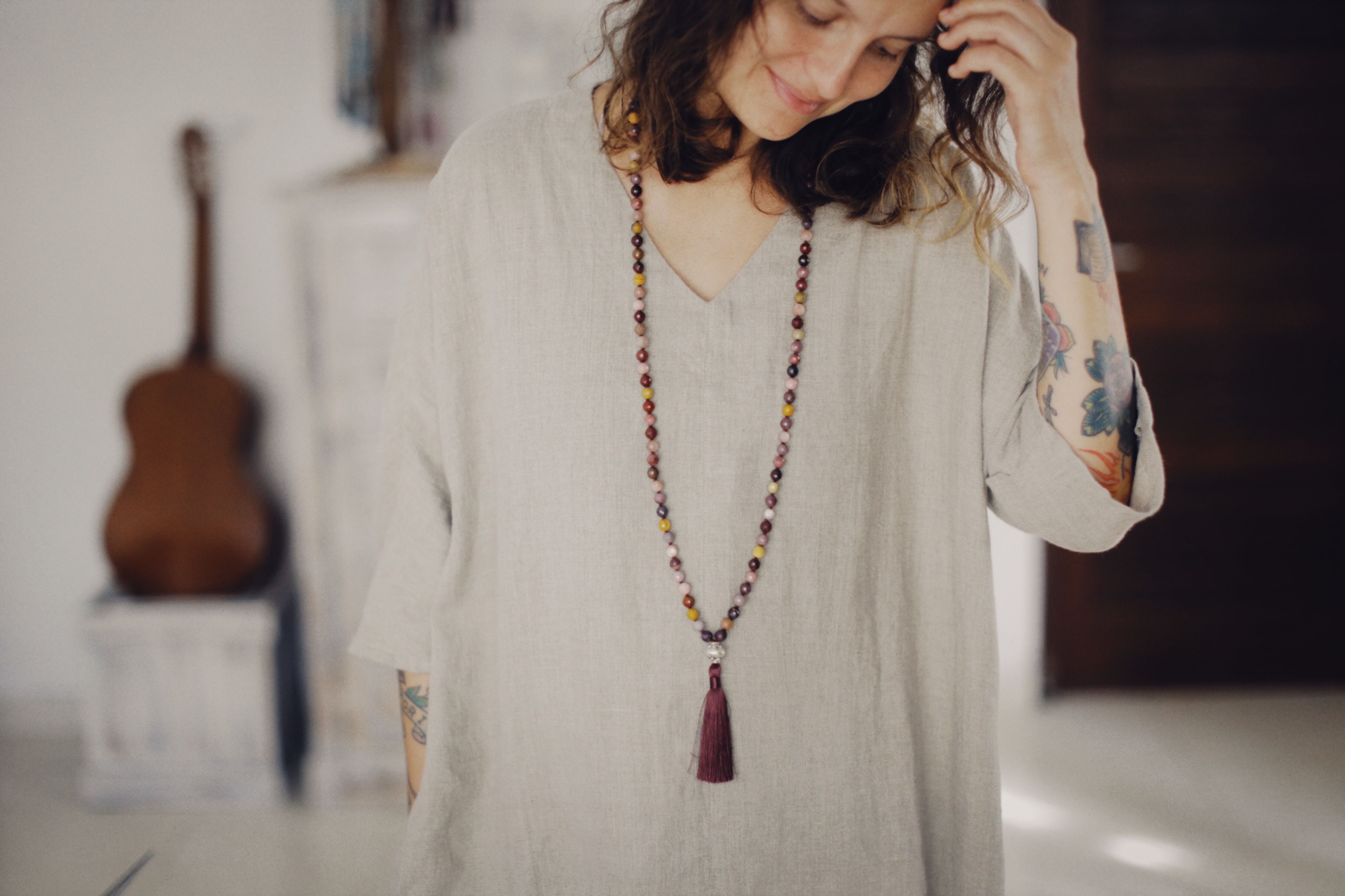 woman wearing soft linen top natural light