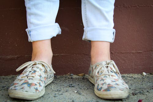 Person Wearing Brown Low-top Sneakers